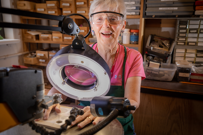 Woman working on art